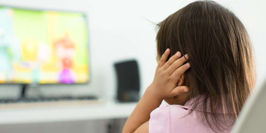 Little girl covering her ears