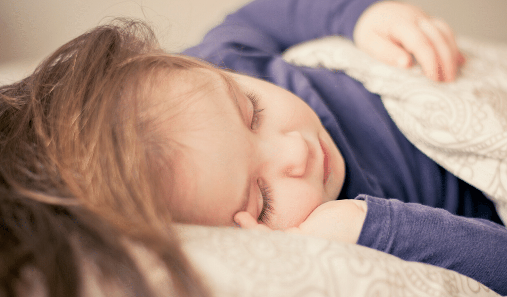 child napping at nursery