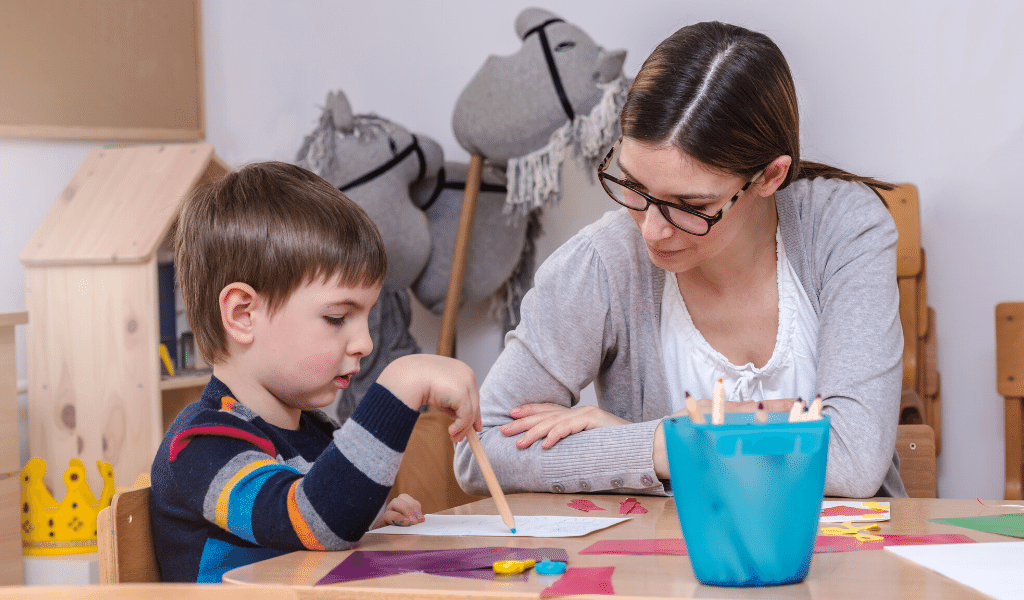 childminder helping a boy