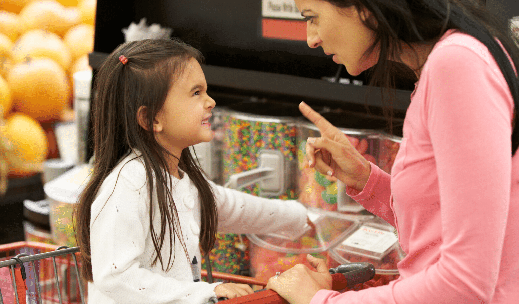 mum and daughter at supermarket