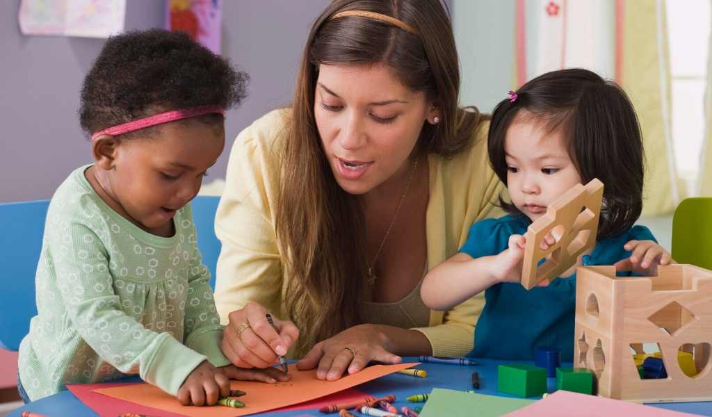 childminder with two toddlers