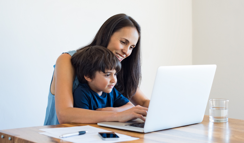 woman and child using video conference at home