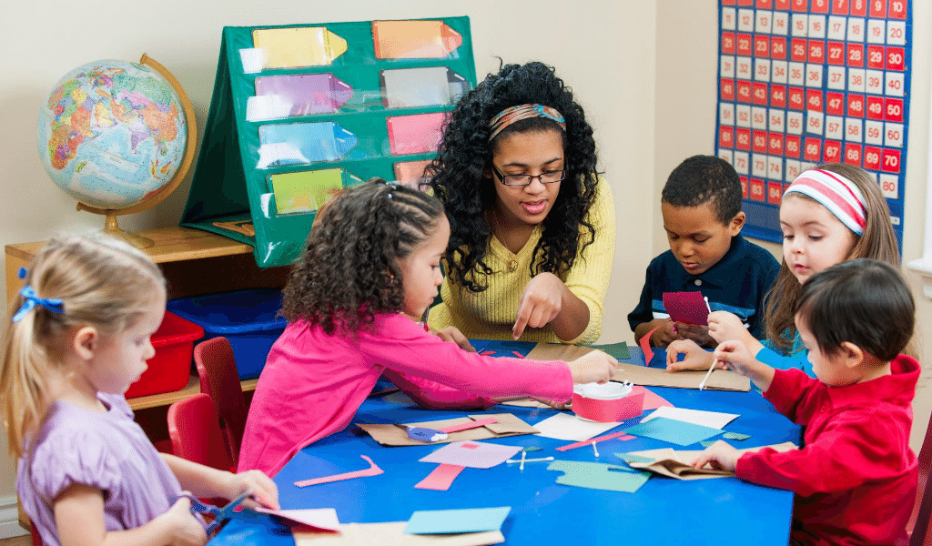 woman observing children