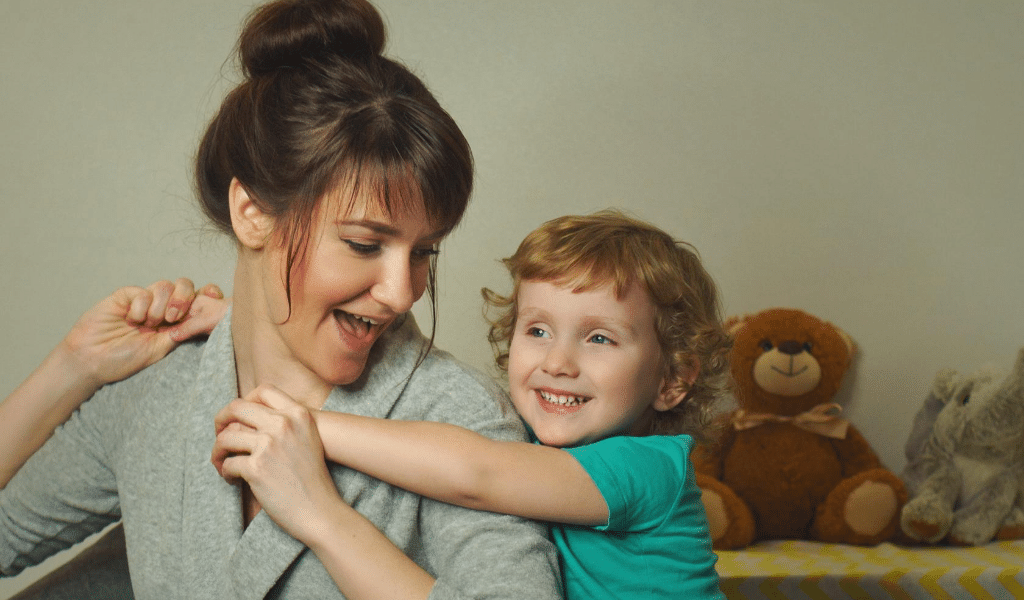 child hugging woman