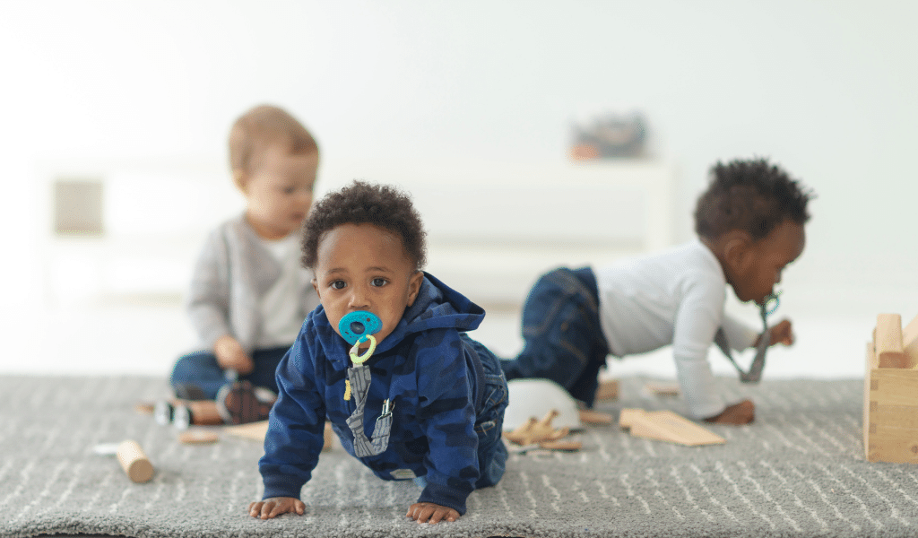 toddlers crawling on the floor