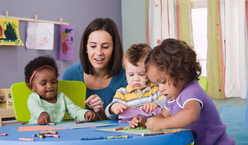 Childminder with diverse children