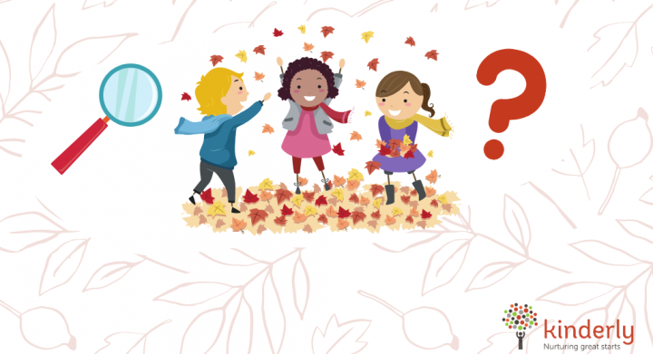 children playing with autumn leaves