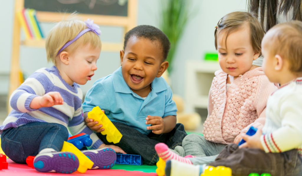 children playing happily on the floor