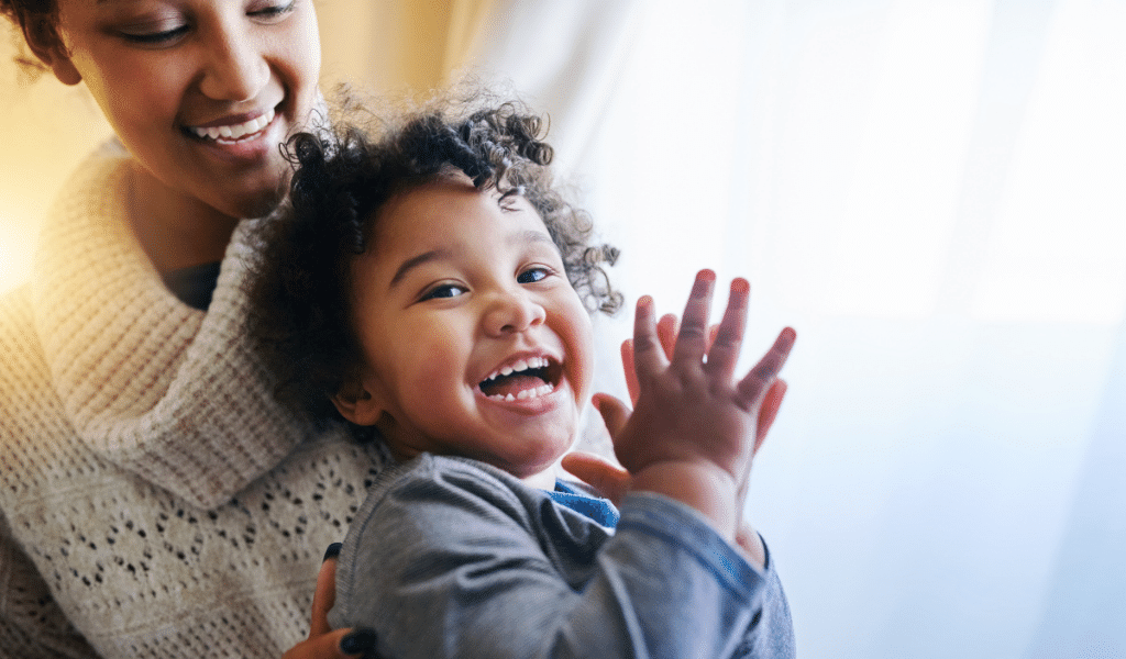 childminder playing with toddler