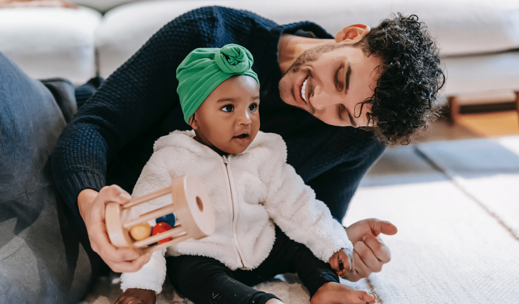 dad playing with toddler