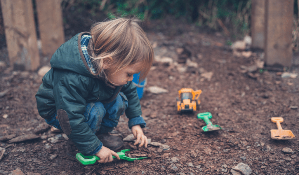 toddler playing outdoors