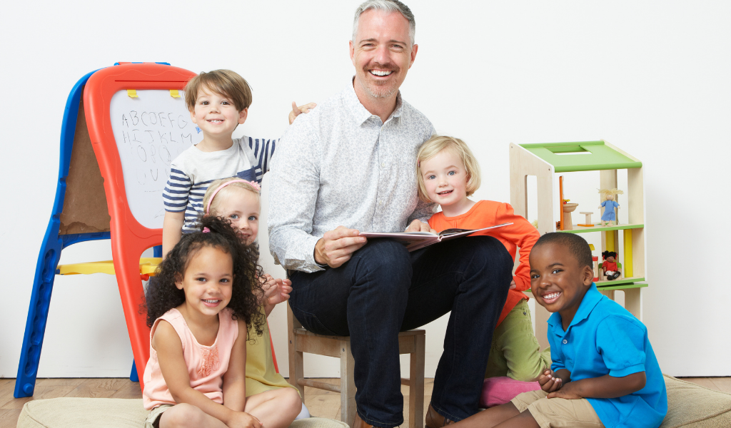 male childminder with children