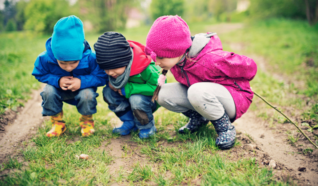 children discovering in nature