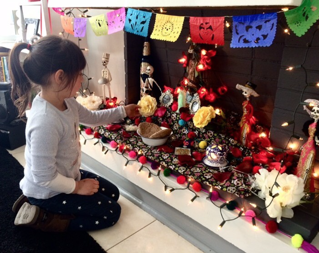 child celebrating day of the dead