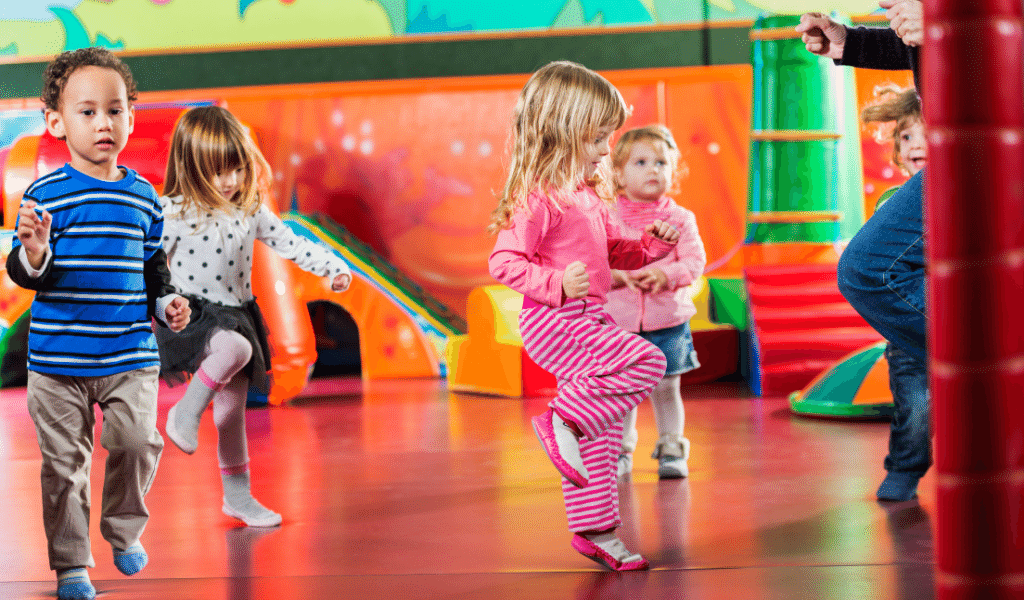 children dancing at nursery