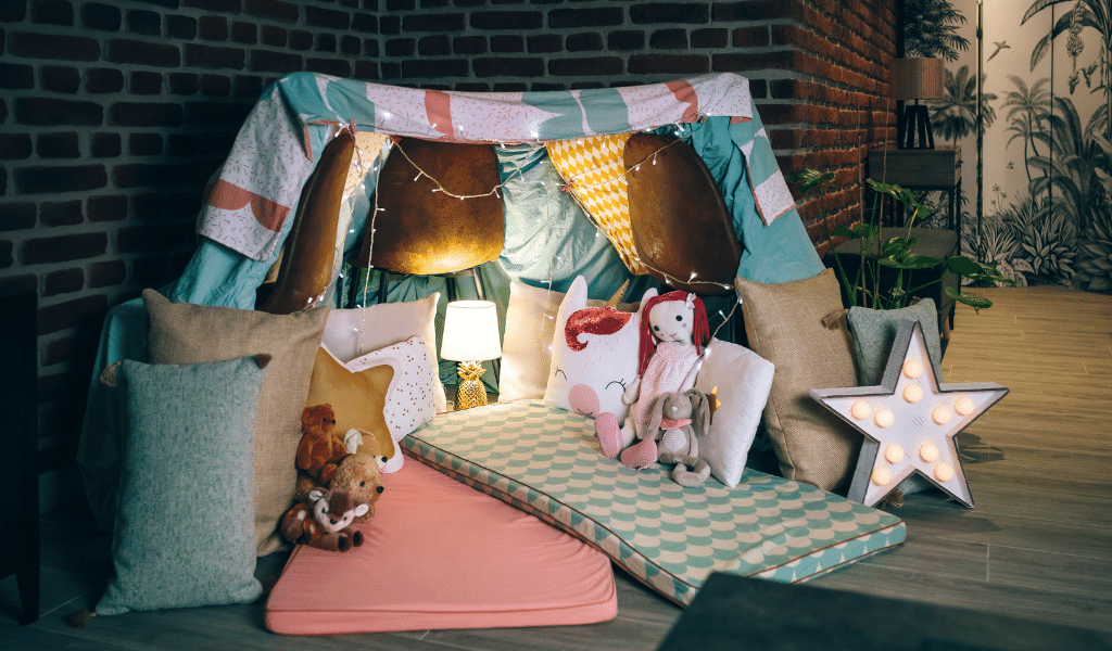 a children's den built with cushions