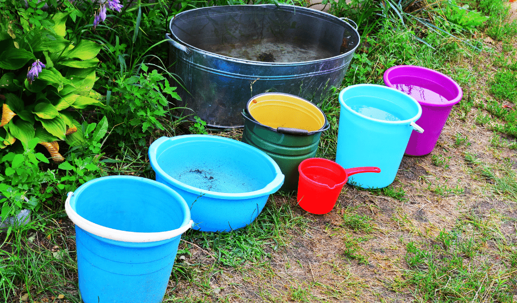 water buckets play outdoors