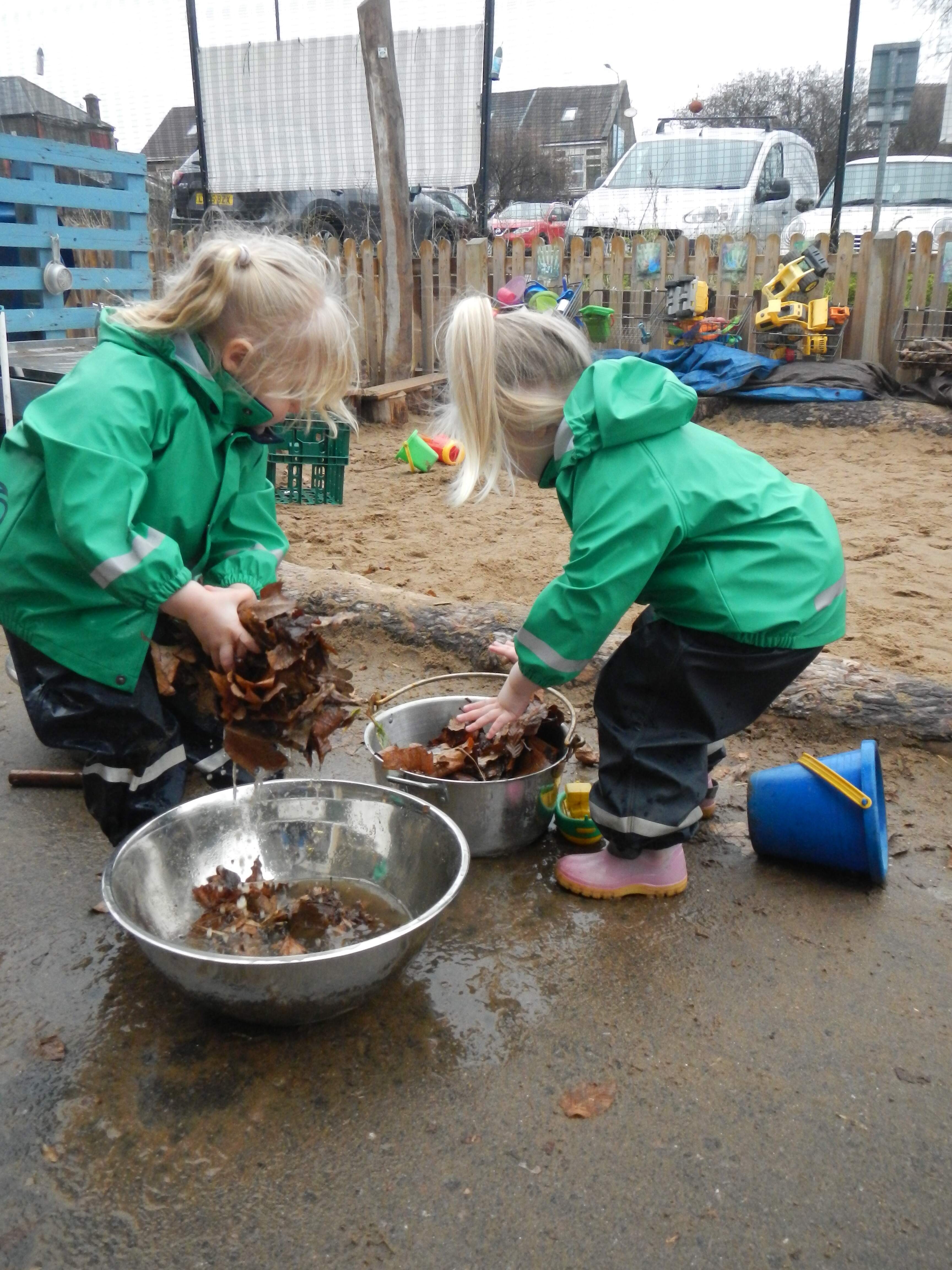 children playing outdoors in nursery