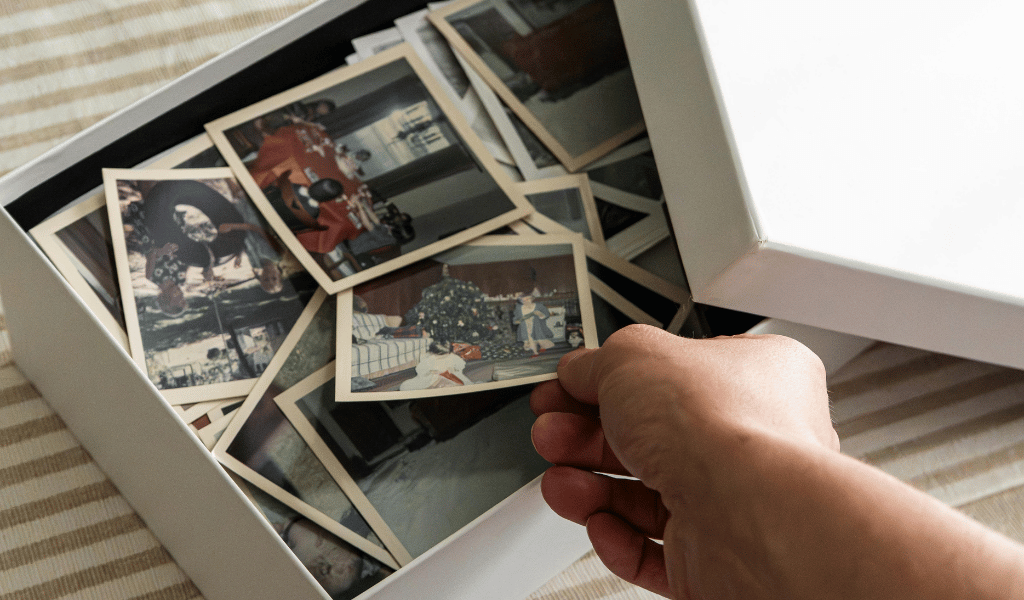 box of old photographs to remember someone who has died